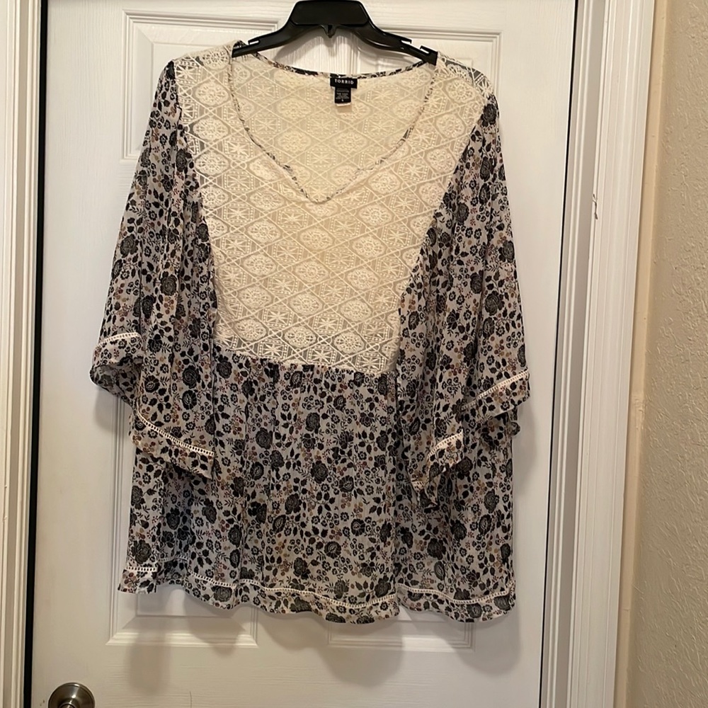 Beautiful Torrid peasant top. In excellent condition.